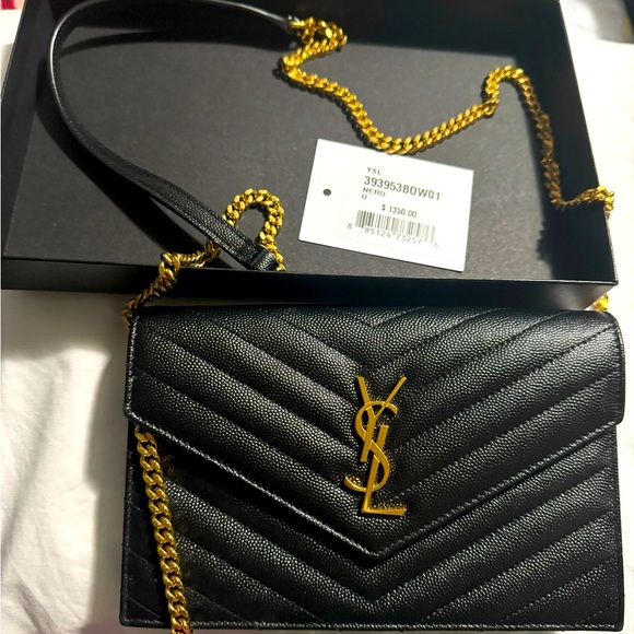 Yves Saint Laurent Handbags - Ysl bag brand new I only used it once !